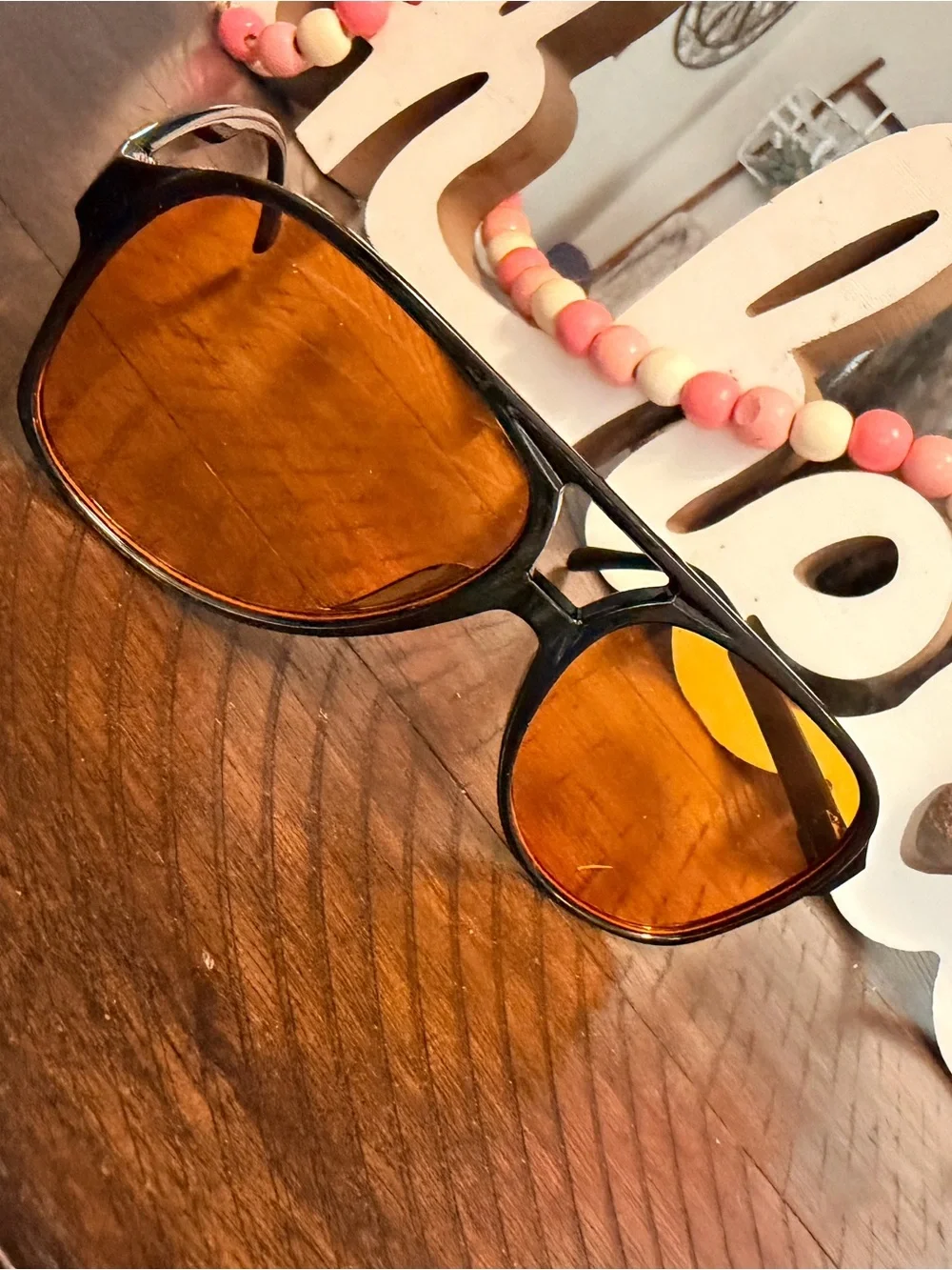 Women's Black Frame Sunglasses with Amber-Orange Lenses